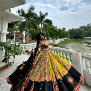 Vibrant Yellow-Orange Lehenga Set with Folk Art Patterns